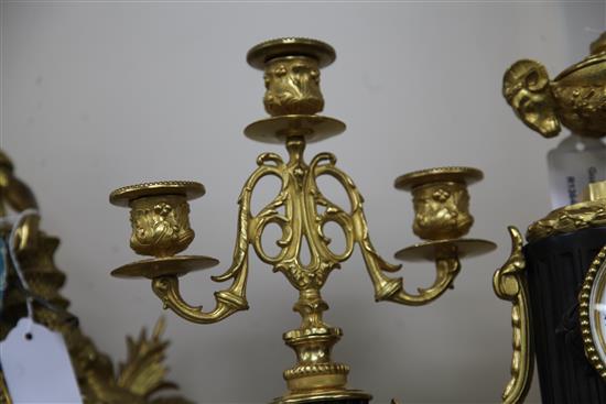 A late 19th century French bronze and ormolu clock garniture, 11.5in.